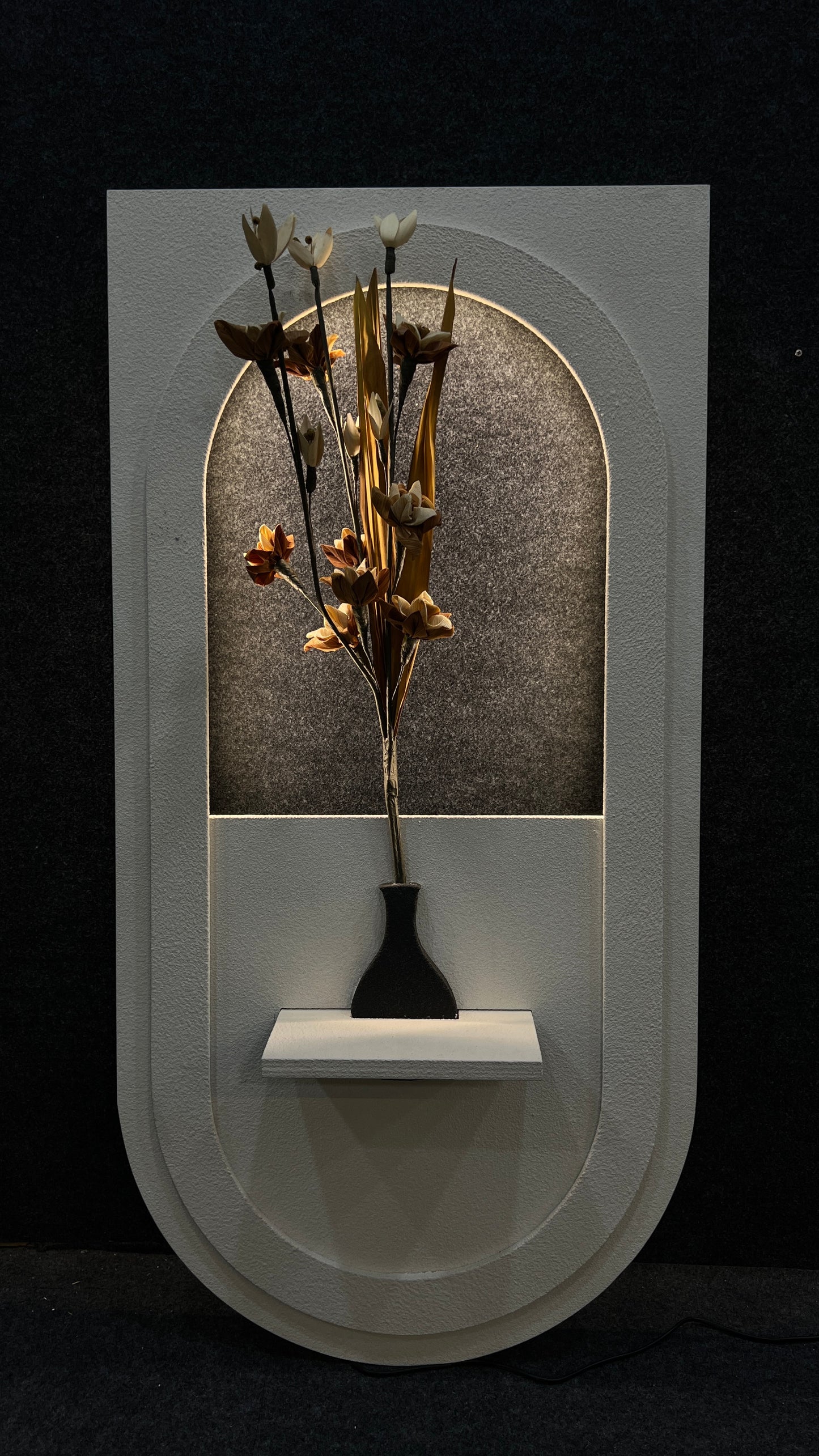 Floral Spotlight – Illuminated Sandstone Panel with Vase